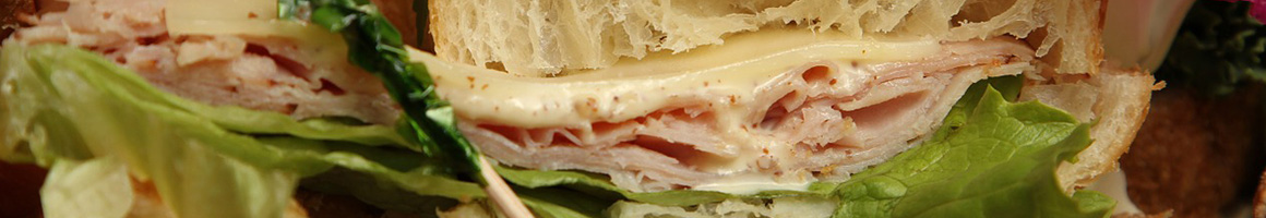 Eating Sandwich at North Island Sandwich Shop restaurant in Batavia, IL.